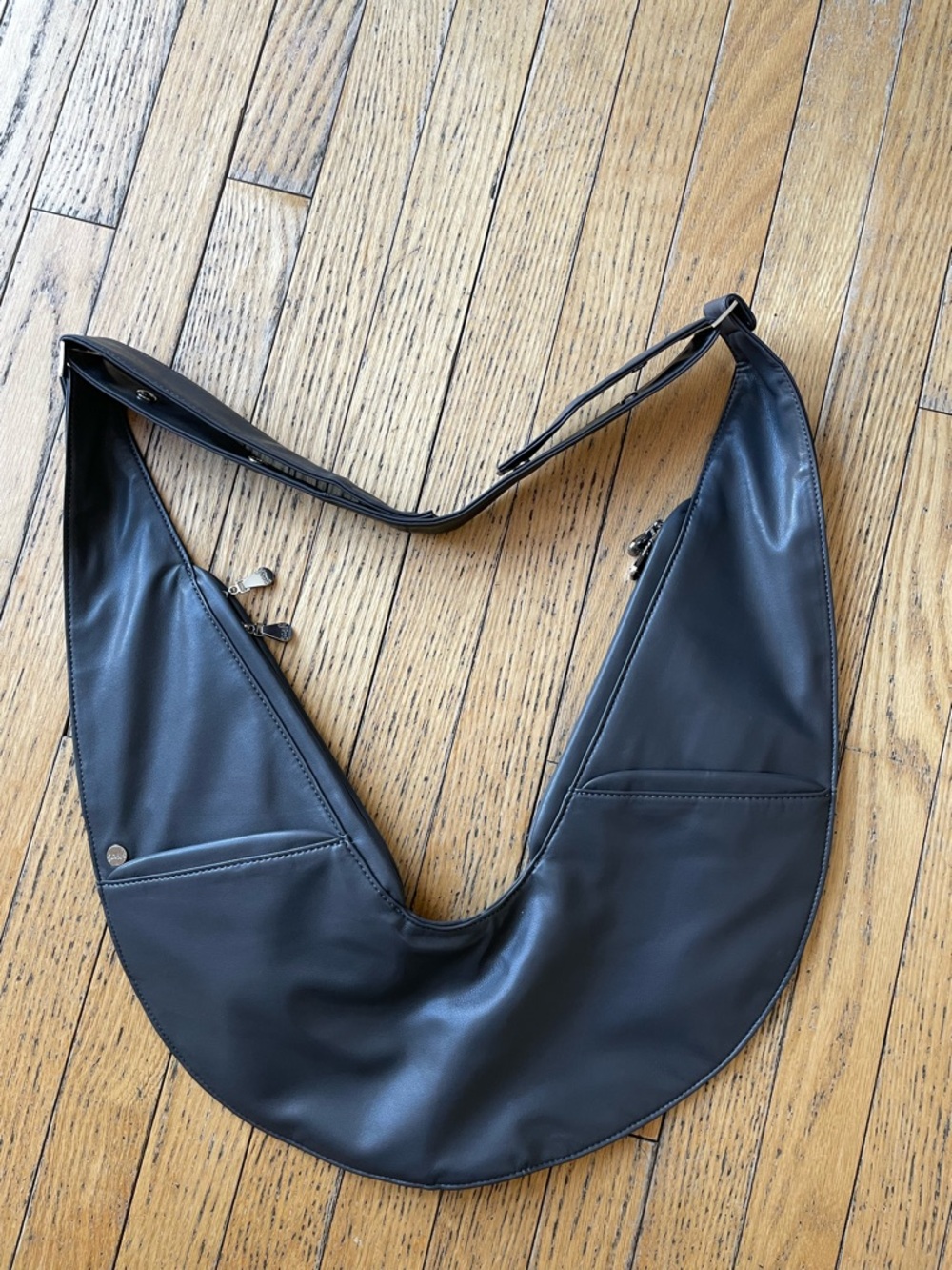 Sash Bag: “Vibranium” faux leather, standard size. Never used. NWOT.